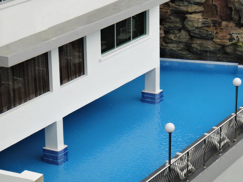 Swimming pool on the podium of the hotel