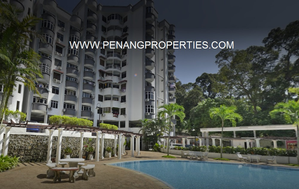 Landscaped poolside with table and chairs