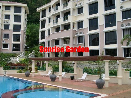 Swimming pool with chairs and shades