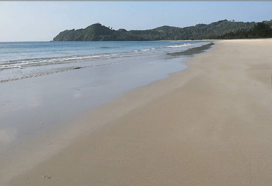 Flat and sandy with pristine white sands