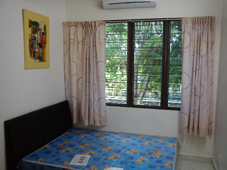 Bedroom with beds and curtains